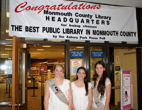 Girl Scouts make donation to the County Library